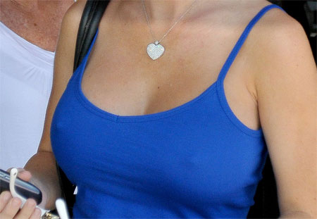 Kendra Wilkinson's got some hard nipples on her hard implants at the 